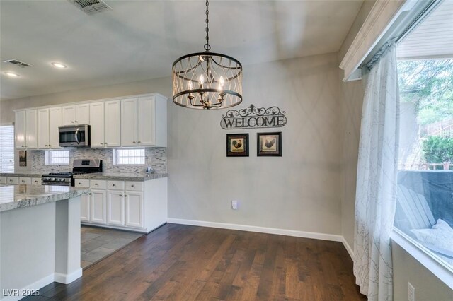 2111 Tiger Links Dr, Henderson, NV 89012 - kitchen featuring stainless steel appliances, dark wood finished floors, baseboards, and recessed lighting