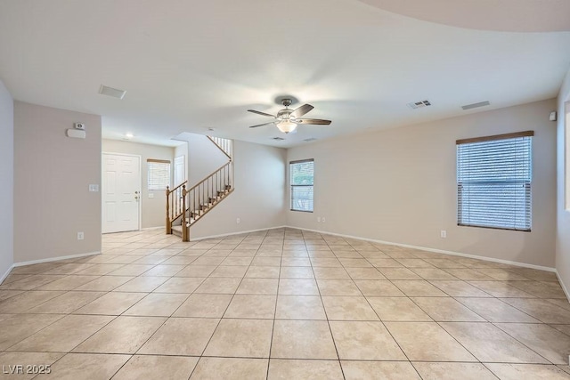 765 Jewel Tower St, Las Vegas, NV 89178 - unfurnished room featuring stairs, ceiling fan, light tile patterned floors, and baseboards