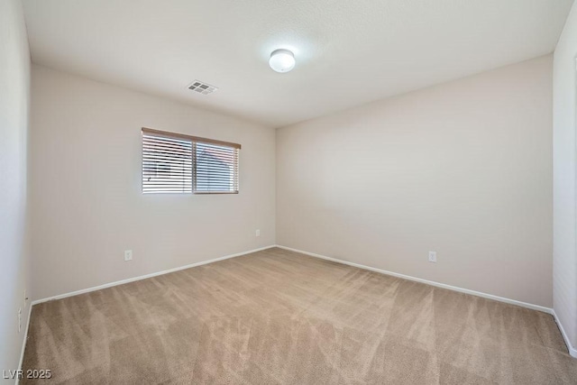 765 Jewel Tower St, Las Vegas, NV 89178 - spare room featuring light colored carpet and baseboards