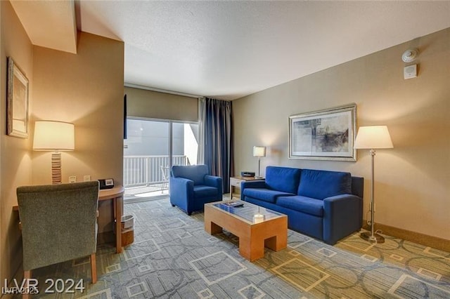211 E Flamingo Rd Unit 615, Las Vegas, NV 89169 - living room featuring carpet flooring and baseboards