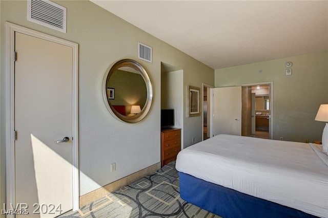 211 E Flamingo Rd Unit 615, Las Vegas, NV 89169 - bedroom featuring carpet