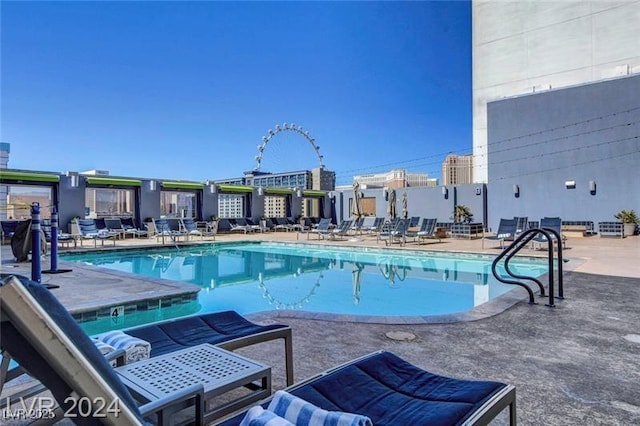 211 E Flamingo Rd Unit 615, Las Vegas, NV 89169 - community pool with a patio area