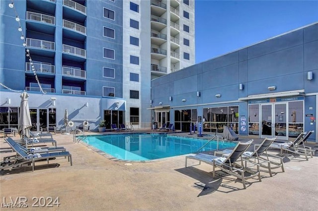 211 E Flamingo Rd Unit 615, Las Vegas, NV 89169 - community pool featuring a patio