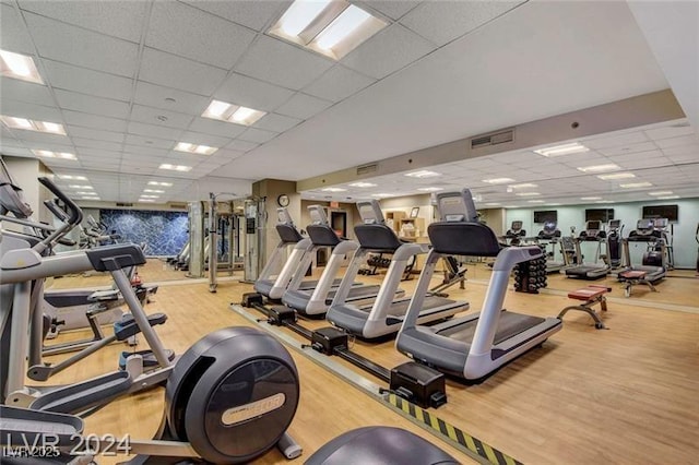 211 E Flamingo Rd Unit 615, Las Vegas, NV 89169 - workout area featuring a drop ceiling and wood finished floors