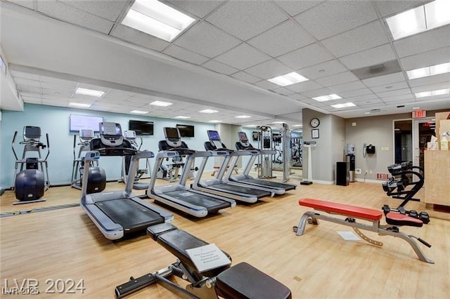 211 E Flamingo Rd Unit 615, Las Vegas, NV 89169 - gym featuring a paneled ceiling, wood finished floors, and baseboards