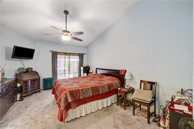 3987 Saddlewood Ct, Las Vegas, NV 89121 - bedroom with light carpet, vaulted ceiling, and a ceiling fan