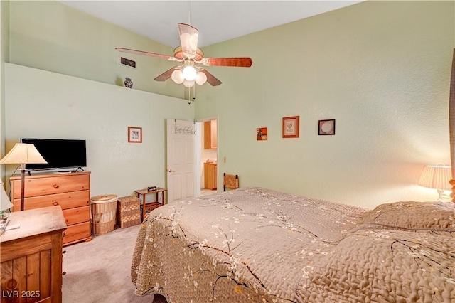 3987 Saddlewood Ct, Las Vegas, NV 89121 - bedroom featuring light carpet, high vaulted ceiling, and a ceiling fan