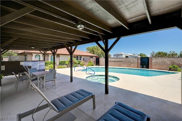 3987 Saddlewood Ct, Las Vegas, NV 89121 - community pool featuring a fenced backyard and a patio area