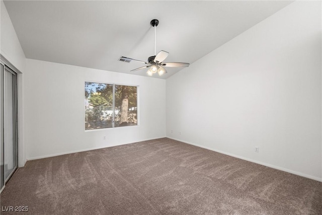 3580 S Shawnee Ave, Pahrump, NV 89048 - unfurnished bedroom featuring carpet floors, lofted ceiling, a ceiling fan, and baseboards