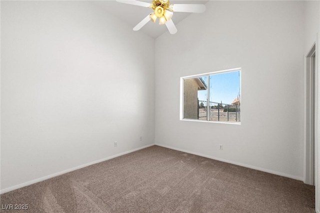 3580 S Shawnee Ave, Pahrump, NV 89048 - empty room featuring carpet floors, a ceiling fan, baseboards, and a towering ceiling