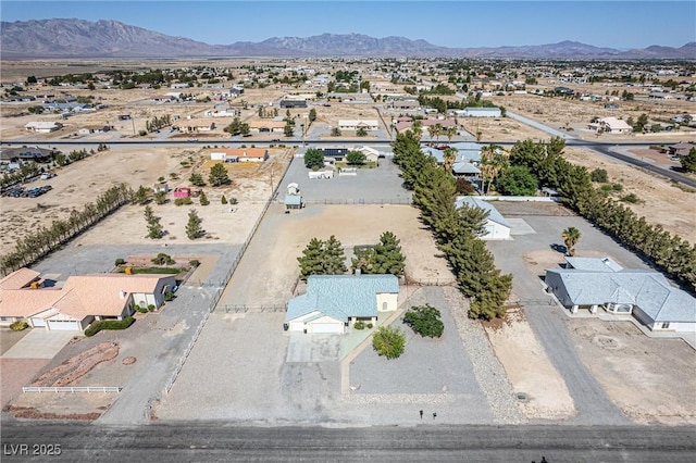 3580 S Shawnee Ave, Pahrump, NV 89048 - aerial perspective of suburban area featuring a mountain backdrop