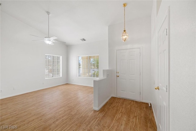 3580 S Shawnee Ave, Pahrump, NV 89048 - foyer with light wood-style flooring, baseboards, and ceiling fan