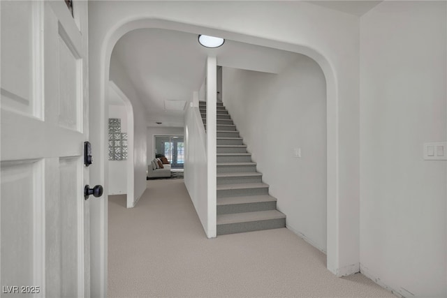 3421 Rochelle Ct, Las Vegas, NV 89121 - staircase with carpet floors and arched walkways