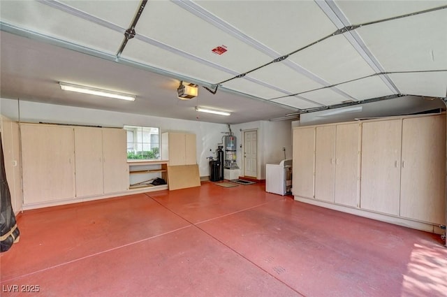 6944 Emerald Springs Ln, Las Vegas, NV 89113 - garage with secured water heater, a garage door opener, and separate washer and dryer