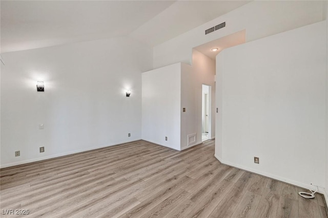 6944 Emerald Springs Ln, Las Vegas, NV 89113 - unfurnished room with light wood-style floors and high vaulted ceiling