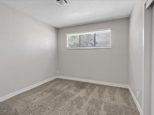 4204 El Jardin Ave, Las Vegas, NV 89102 - spare room with carpet flooring, a textured ceiling, and baseboards