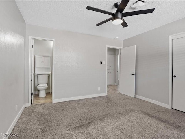 4204 El Jardin Ave, Las Vegas, NV 89102 - unfurnished bedroom featuring carpet floors, ensuite bath, a textured ceiling, baseboards, and a closet