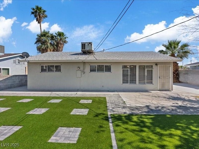 4204 El Jardin Ave, Las Vegas, NV 89102 - back of house featuring stucco siding, a patio area, and central air condition unit