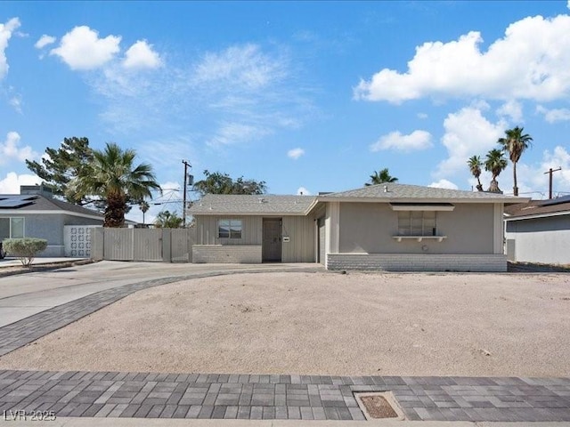 4204 El Jardin Ave, Las Vegas, NV 89102 - ranch-style home featuring brick siding, a gate, and driveway