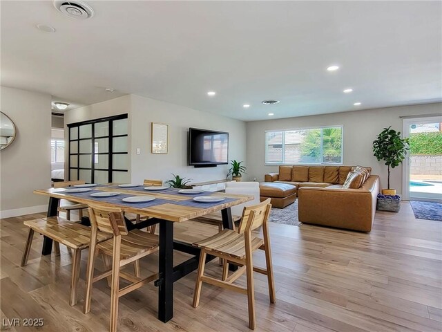 4072 E Harmon Ave, Las Vegas, NV 89121 - dining space with light wood-style floors, recessed lighting, and baseboards