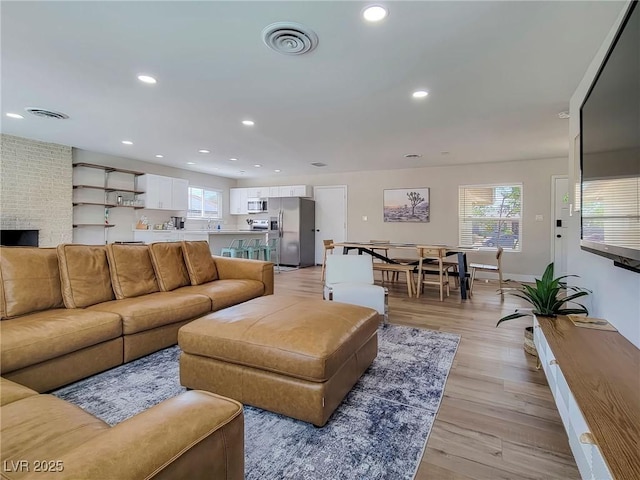 4072 E Harmon Ave, Las Vegas, NV 89121 - living area with recessed lighting and light wood finished floors