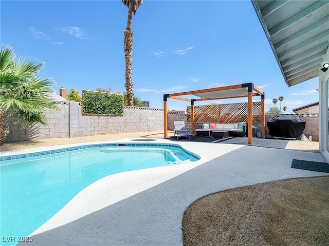 4072 E Harmon Ave, Las Vegas, NV 89121 - view of pool featuring an outdoor living space, a patio area, and a fenced backyard