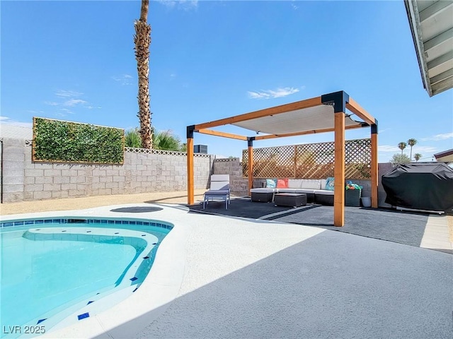 4072 E Harmon Ave, Las Vegas, NV 89121 - view of swimming pool with an outdoor living space, a patio, and a fenced backyard