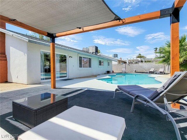 4072 E Harmon Ave, Las Vegas, NV 89121 - view of swimming pool with a patio area and a fenced backyard