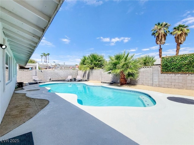 4072 E Harmon Ave, Las Vegas, NV 89121 - view of pool with a patio and a fenced backyard