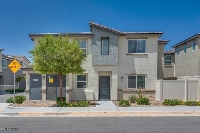 12110 Midnight Pine Rd Unit 4, Las Vegas, NV 89183 - view of property with stucco siding and a tiled roof