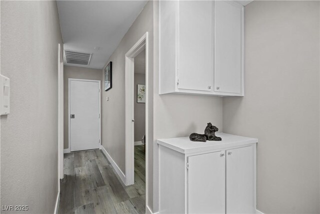 5375 Chestnut St, Las Vegas, NV 89119 - corridor featuring wood finished floors and baseboards