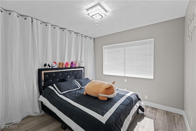 5375 Chestnut St, Las Vegas, NV 89119 - bedroom featuring wood finished floors and baseboards