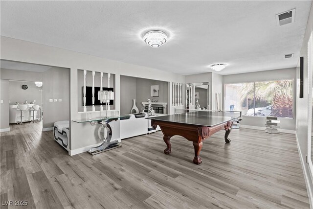5375 Chestnut St, Las Vegas, NV 89119 - recreation room featuring wood finished floors and pool table