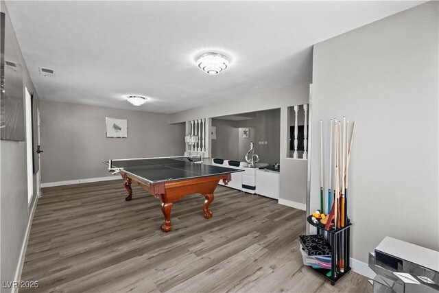 5375 Chestnut St, Las Vegas, NV 89119 - playroom with baseboards and wood finished floors