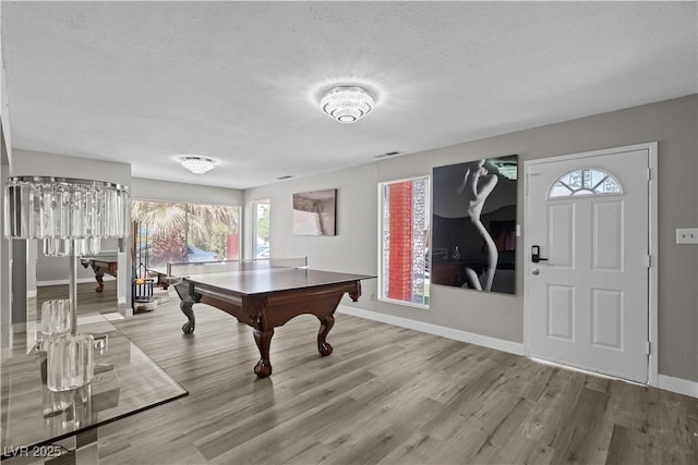 5375 Chestnut St, Las Vegas, NV 89119 - game room with wood finished floors, a textured ceiling, plenty of natural light, and billiards table