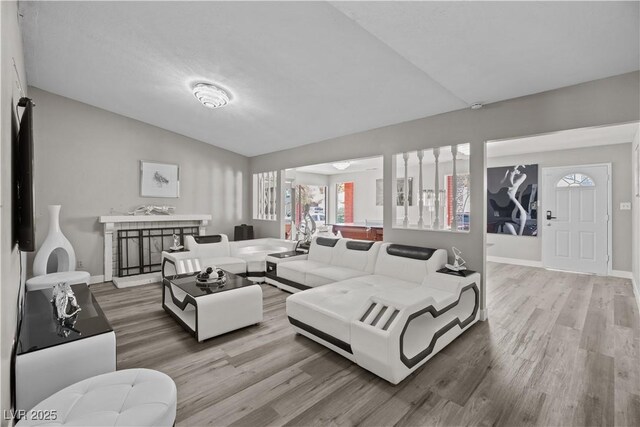 5375 Chestnut St, Las Vegas, NV 89119 - living room with vaulted ceiling and wood finished floors