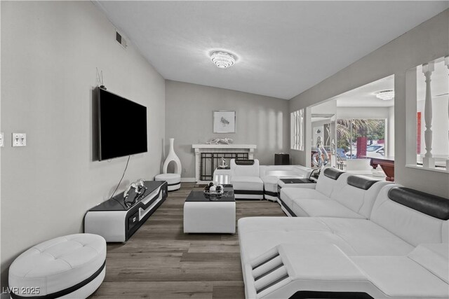 5375 Chestnut St, Las Vegas, NV 89119 - living room with wood finished floors and vaulted ceiling