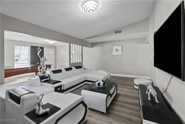 5375 Chestnut St, Las Vegas, NV 89119 - living room with vaulted ceiling and wood finished floors