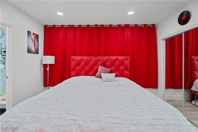 5375 Chestnut St, Las Vegas, NV 89119 - bedroom with recessed lighting, a closet, and wood finished floors