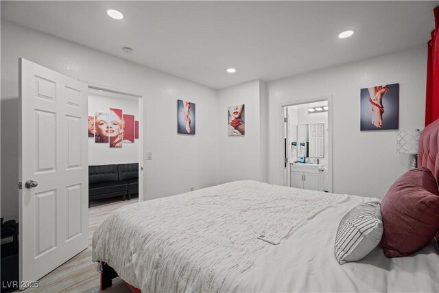 5375 Chestnut St, Las Vegas, NV 89119 - bedroom featuring light wood finished floors, recessed lighting, and ensuite bathroom