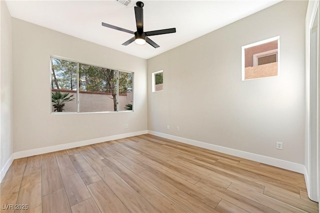 10017 Snow Crest Pl, Las Vegas, NV 89134 - empty room with healthy amount of natural light, a ceiling fan, and light wood-type flooring