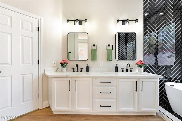 10017 Snow Crest Pl, Las Vegas, NV 89134 - bathroom with double vanity and a soaking tub