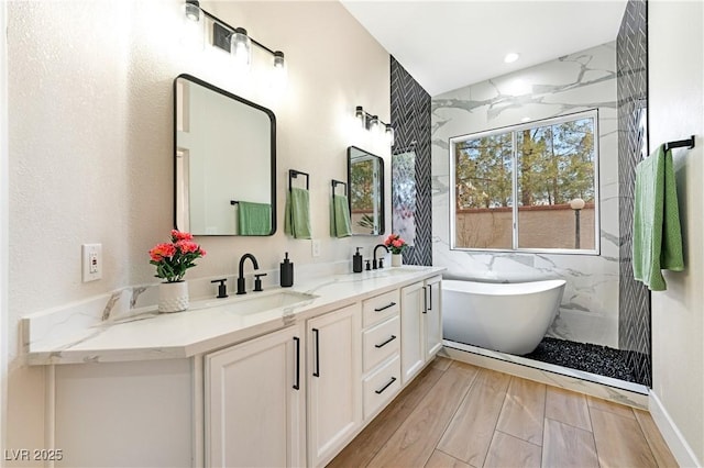 10017 Snow Crest Pl, Las Vegas, NV 89134 - full bath featuring double vanity, a freestanding bath, a shower, and recessed lighting