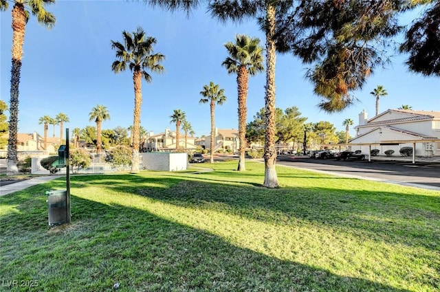 7952 Diamond Rock Way Unit 102, Las Vegas, NV 89128 - surrounding community with a lawn and a residential view