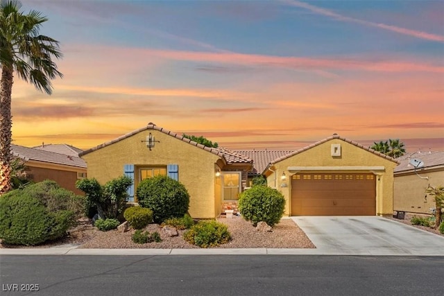 7252 Royal Melbourne Dr, Las Vegas, NV 89131 - mediterranean / spanish-style house with stucco siding, a garage, driveway, and a tile roof
