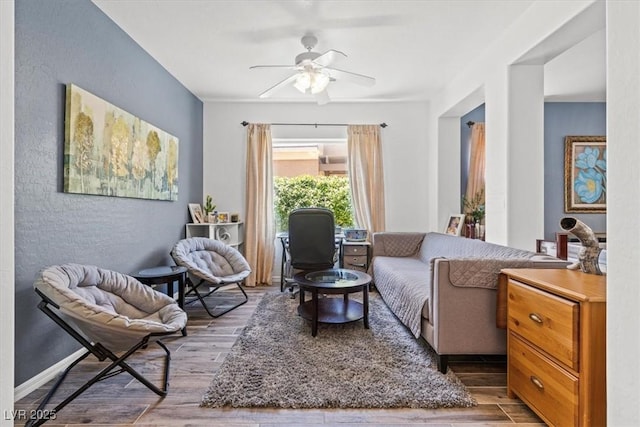 7252 Royal Melbourne Dr, Las Vegas, NV 89131 - sitting room with wood finished floors and a ceiling fan