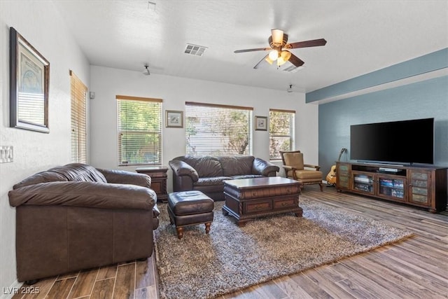 7252 Royal Melbourne Dr, Las Vegas, NV 89131 - living area with wood finished floors and a ceiling fan