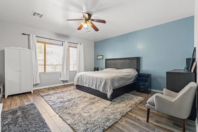 7252 Royal Melbourne Dr, Las Vegas, NV 89131 - bedroom featuring wood finished floors, baseboards, and a ceiling fan