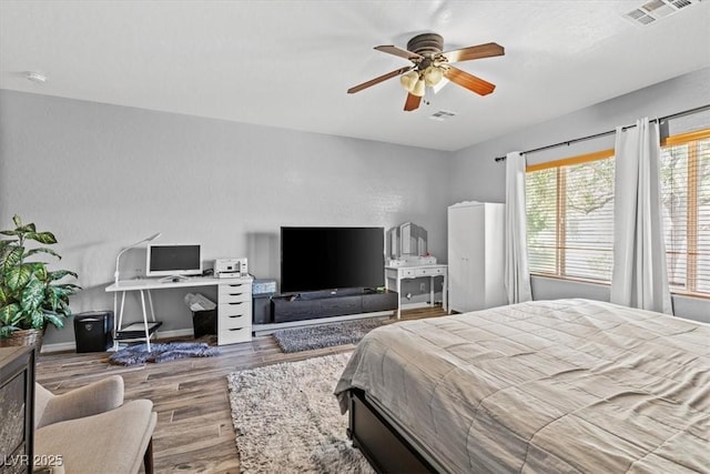 7252 Royal Melbourne Dr, Las Vegas, NV 89131 - bedroom featuring wood finished floors and ceiling fan