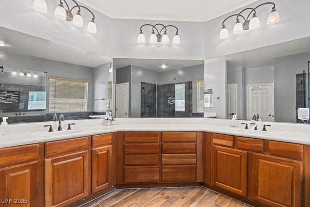 7252 Royal Melbourne Dr, Las Vegas, NV 89131 - bathroom with a shower stall, double vanity, and wood finished floors